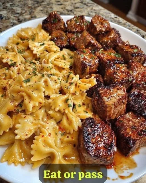 Creamy Garlic Butter Chicken & Linguine in Alfredo Sauce Creamy garlic butter chicken with linguine in Alfredo sauce served in a bowl