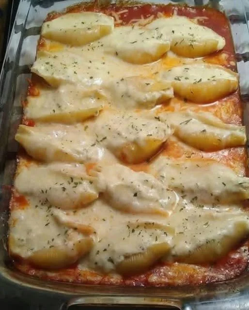 Cheese-Stuffed Jumbo Shells Delicious cheese-stuffed jumbo shells ready to be served.