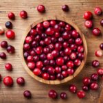 Ripe,Fresh,Cranberry,In,Wooden,Bowl,On,Rustic,Table,Top